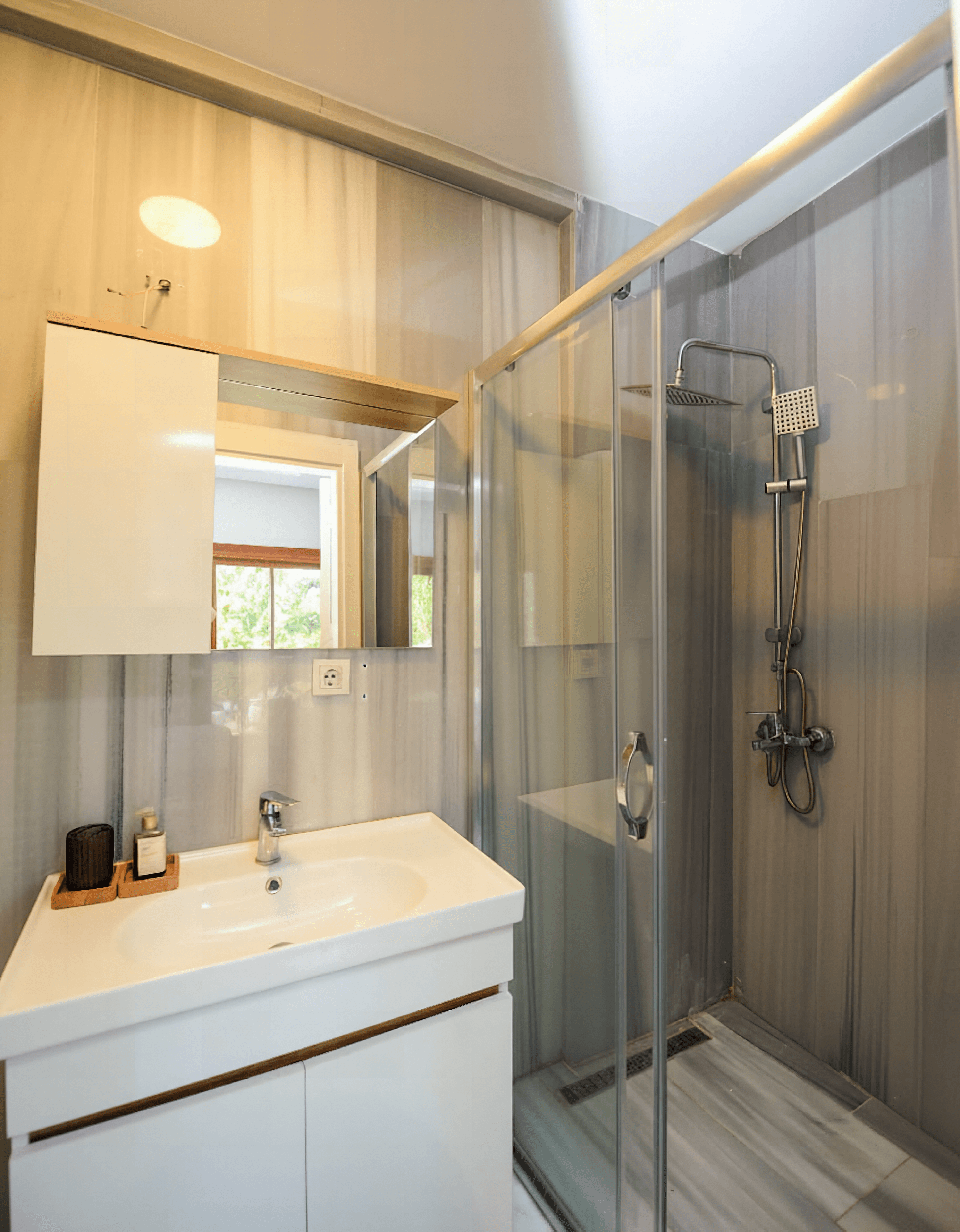 Bathroom with rain shower and garden view window